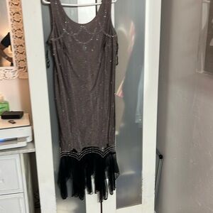 Grey dress with black see through . Rhinestones